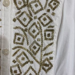 Chico’s gold beaded long sleeve blouse